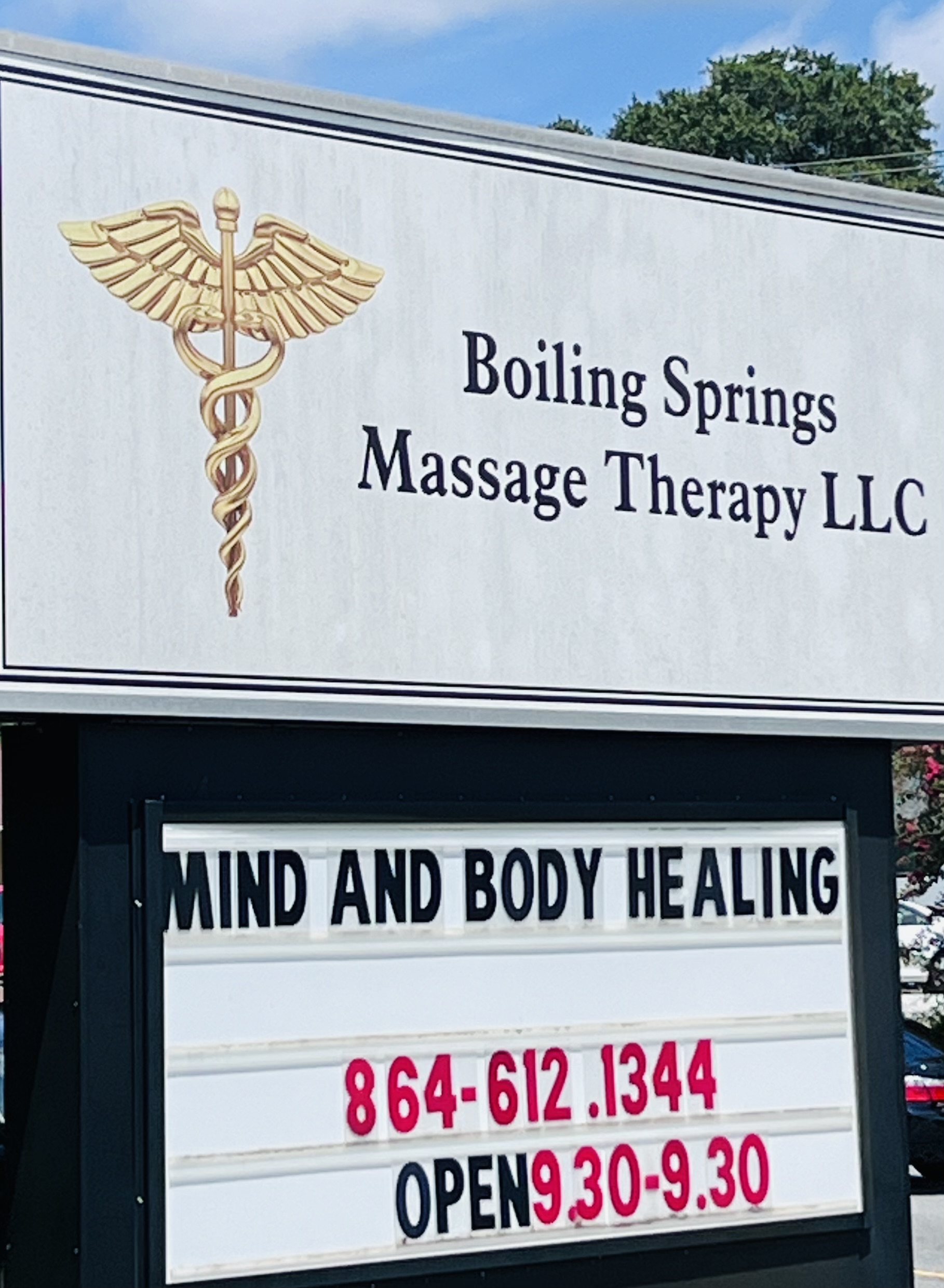 Our sign on Boiling Springs Road: Mind and Body Healing, open 9:30 to 9:30